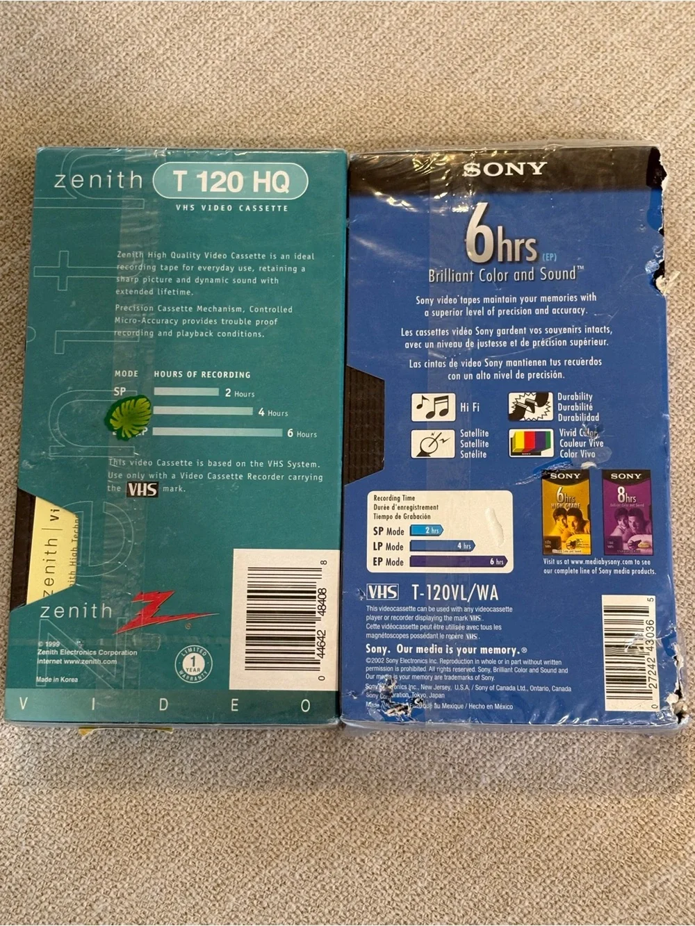two vintage blank T-120 VHS video cassette tapes made by Zenith and Sony
